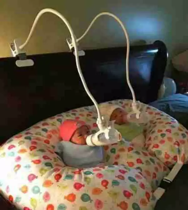 Creative Or Nah? Checkout The Way This Parents Are Feeding Their Twins